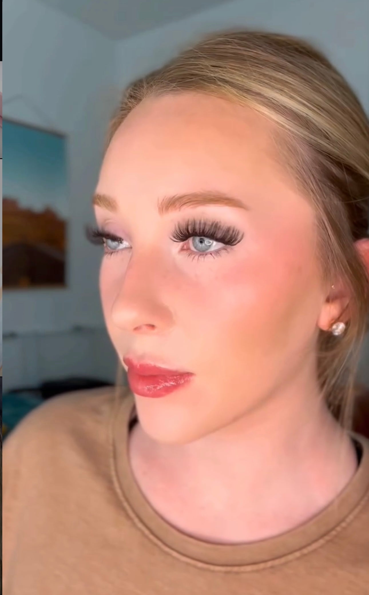 Model wearing Wildflower D curl lash clusters. 12–15mm wispy mega volume falsies with doll-eye shape for at-home lash extension look.