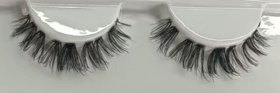 Girl Next Door DIY lash extensions with wispy lash clusters for at-home use. 13mm soft C curl falsies applied under lash line using waterproof lash glue.