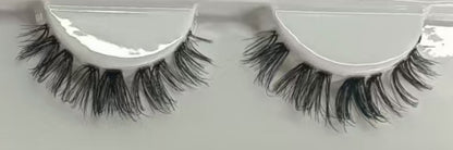 Girl Next Door DIY lash extensions with wispy lash clusters for at-home use. 13mm soft C curl falsies applied under lash line using waterproof lash glue.