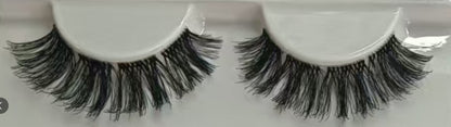 Boho-inspired flat lay of Wildflower lash clusters. Hippie-style DIY lashes with crochet, florals, and 12–15mm eyelash extensions for soft glam.