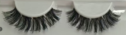 Boho-inspired flat lay of Wildflower lash clusters. Hippie-style DIY lashes with crochet, florals, and 12–15mm eyelash extensions for soft glam.